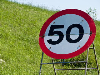 Temporary 50 mph speed restriction sign
