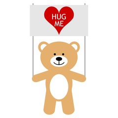 Toy bear with heart and text hug me