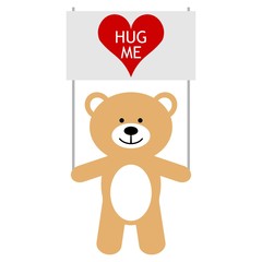Toy bear with heart and text hug me