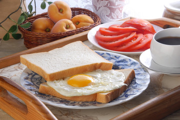Healthy ham sandwich with cheese and tomato, fried egg         