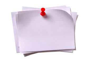 Several pile heap stack plain white oblong sticky post it note with red pushpin isolated on white background photo