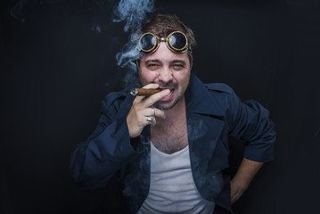 Steampunk smoker with a cuban cigar