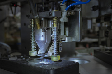 Chuck suite of automated machinery for assembly product heat sink.Auto robot in electronics industrial.