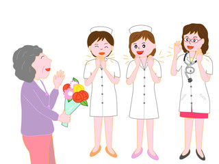 高齢者が退院するのを見送る看護師と医者