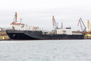 RORO ship in port at on ferry. ferryboat terminal on loading, unloading.