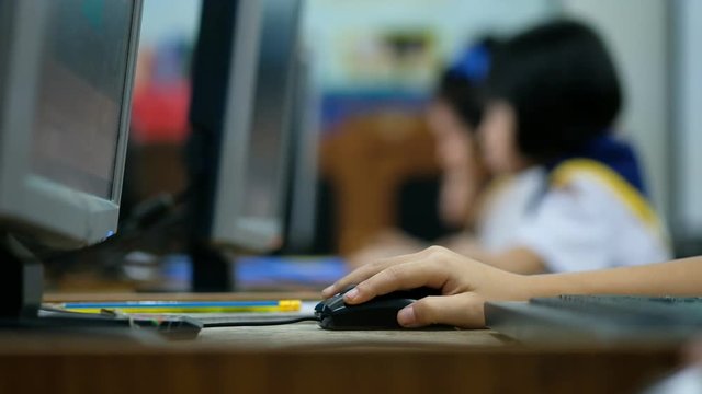 education and school concept, students in computer class