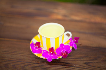 delicious green tea in a beautiful glass bowl on table