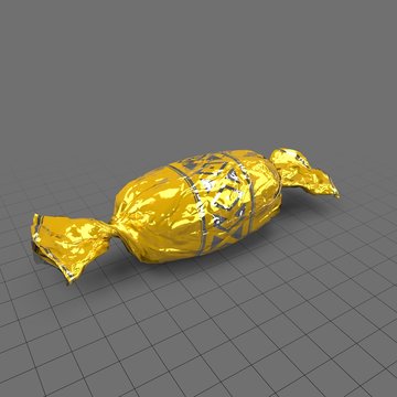 Hard candy in yellow and silver wrapper