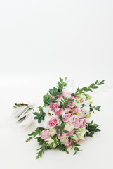 Pink Bridal Bouquet of Roses, Alstroemeria, Chrysanthemum and Eustoma Isolated on White Background. Vertical Image with Copy Space.