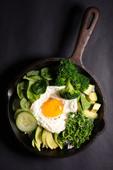 green vegetable and fried egg