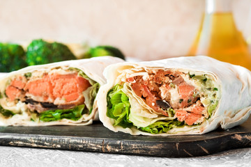 Roll with salmon in pita bread