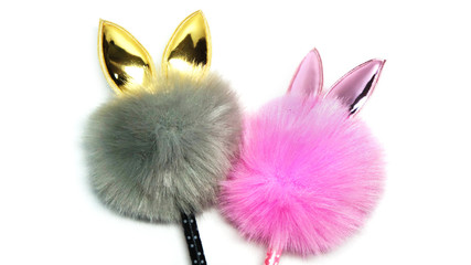 Colorful stationery. Funny souvenir pen with big pompon and cat ears on the top. Two gray and pink toy cats as symbol of love, cute couple isolated on white. Valentine's day celebration card