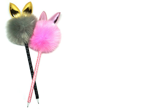 Colorful stationery. Funny souvenir pen with big pompon and cat ears on the top. Two gray and pink toy cats as symbol of love, cute couple isolated on white. Valentine's day celebration card