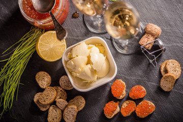 top view of caviar baquette butter selection 