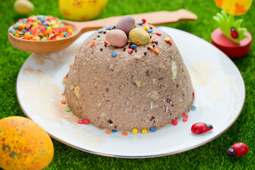 Chocolate curd easter with colorful sprinkling