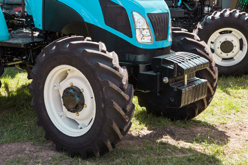 Fototapeta na wymiar Modern tractor on modern agricultural machinery.