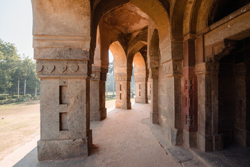 Fototapeta na wymiar Arch of the ancient temple in Delhi, India.