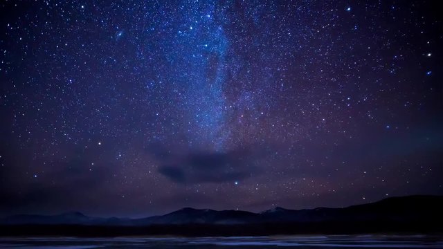 Winter forest timelapse, frosty and pure air, a night sky with millions of stars. Sikhote-Alin Nature Reserve, a biosphere reserve in Russia.
