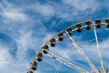 Ferris whell against blue sky
