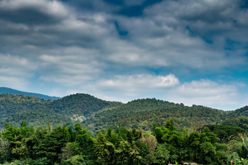 Naklejka premium Mountain with white cloud on Blue sky