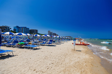 Fototapeta na wymiar Beautiful summer beach of Pesaro city on the adriatic sea. Marche, Italy. 