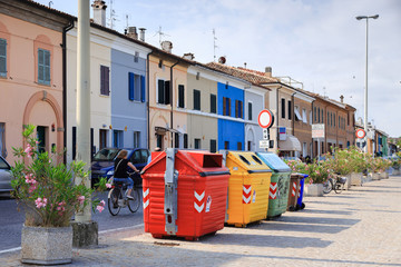 Large colorful garbage bins (trash cans) dedicated for separate collection of rubbish.
Colorful buildings in center of Pesaro, Marche, Italy