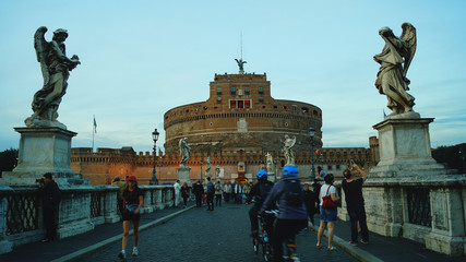 View on famous Saint Angel castle and bridge in Rome, Italy.