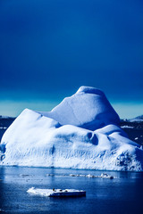 Penguins infrontof iceberg antarctica 2