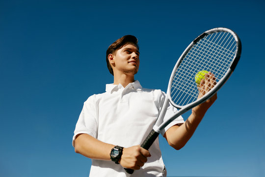 Tennis Sport. Man Playing Tennis Outdoors
