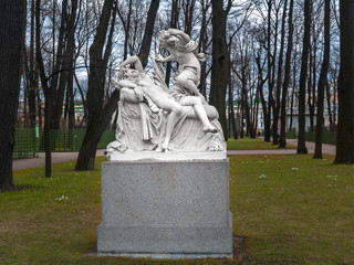 Sculpture Amur and Psyche in the park Summer Garden in April in St. Petersburg