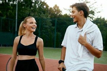 Happy Couple After Playing Tennis