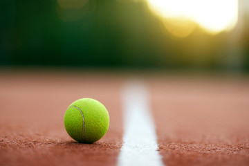 Sports. Close Up Shot Of Tennis Ball On Court.