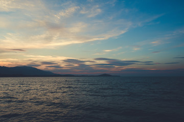 Image of sea or ocean and mountain with beautiful  background before sunset in the evening time