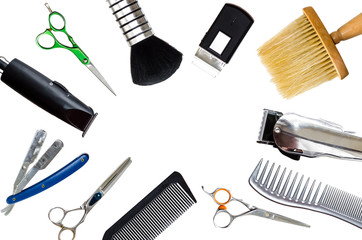 Combs, clipper and other hairdresser tools isolated on white background.
