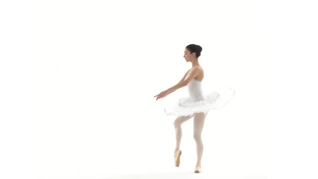 Ballerina dancing with white tutu on white background