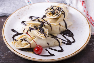Pancakes with chocolate sauce