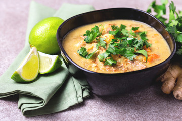 Indian Mulligatawny soup with lentil, parsley. Copyspace, horizontal view.