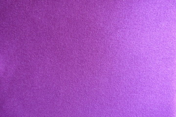 Fototapeta premium Fuchsia colored thin knitted fabric from above