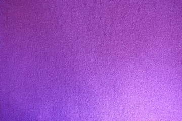 Fototapeta premium Pinkish violet thin knitted fabric from above
