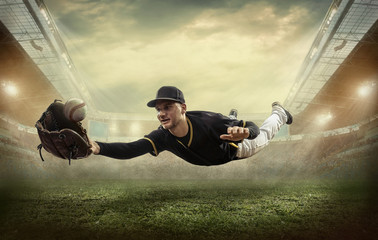 Baseball players in action on the stadium. © Andrii IURLOV