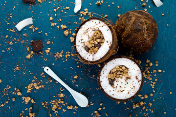 Healthy breakfast in coconut bowl.