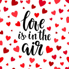 love is in the air. Hand drawn brush pen lettering on pink glittering hearts background. design for holiday greeting card and invitation of the wedding, Valentine s day and love day.