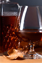 Brandy and dried up oak leaves .
