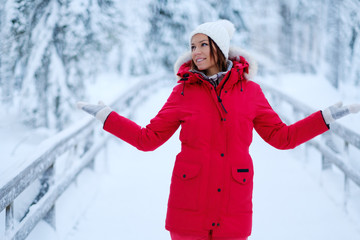 Happy woman in a snow landscape