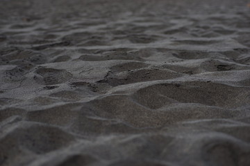 close up of black rough Sandpaper sheet texture use as Background
