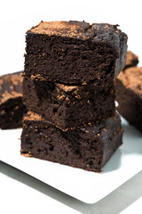 dessert - pieces of chocolate brownies, vertical closeup