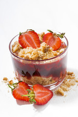 dessert with fresh strawberries, biscuits and cream, closeup