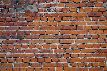 Texture of old brick medieval wall, made of red brick.