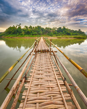 Beautiful view of a bamboo bridge. Laos landscape.