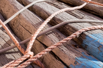 Wooden boards with ropes